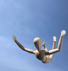Figure falling through sky